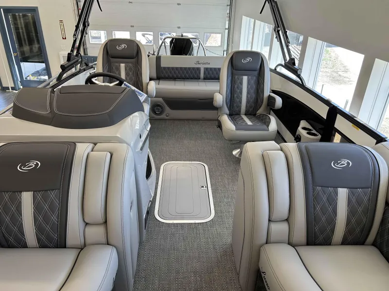 Slide: The Image of Luxurious interior of 2025 Barletta Lusso 23UC pontoon boat with plush seating and elegant design. - 10