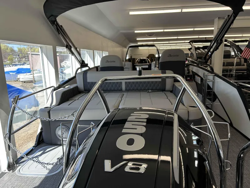 Slide: The Image of 2025 Barletta Lusso 23UC pontoon boat interior with luxurious seating and powerful V8 engine. - 3