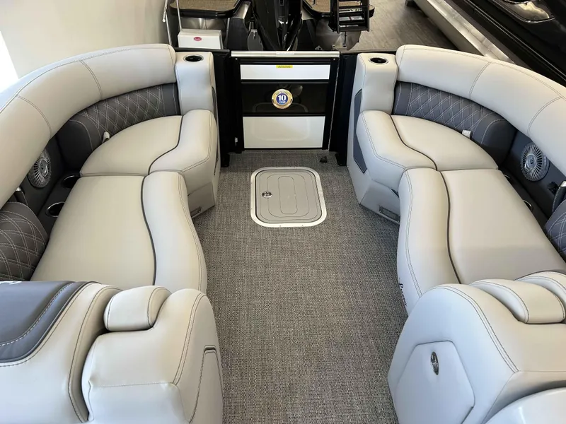 Slide: The Image of 2025 Barletta Lusso 23UC pontoon boat interior with luxurious seating and modern design. - 9