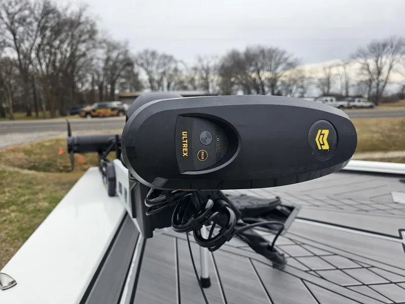 Slide: The Image of 2025 Avid 18 Vertex Crappie boat with Ultrex trolling motor on deck. - 13