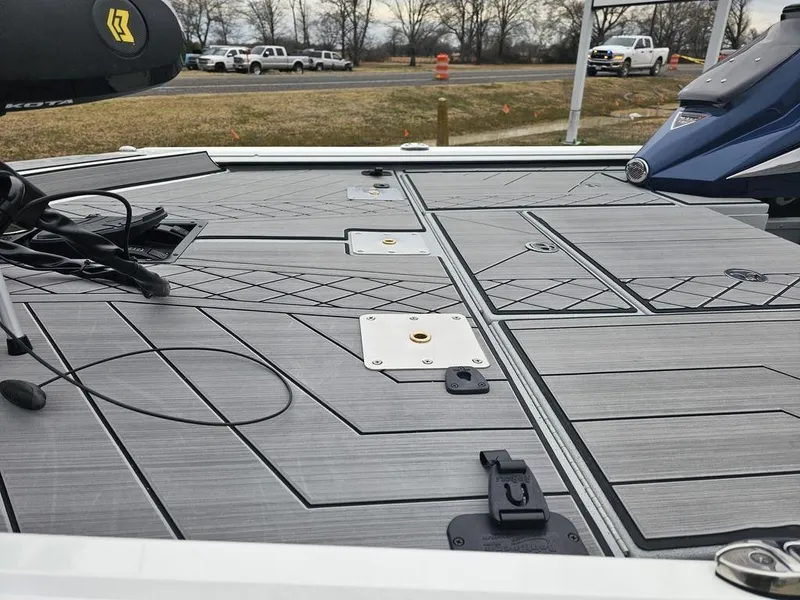 Slide: The Image of 2025 Avid 18 Vertex Crappie boat deck with modern design and fixtures. - 14