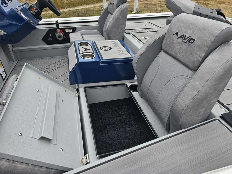 Slide: The Image of 2025 Avid 18 Vertex Crappie boat interior with storage compartment and seating. - 15