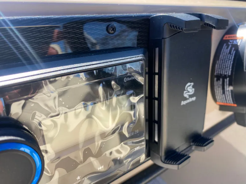 Slide: The Image of Control panel of 2025 SunCatcher Select 322RC with Bluetooth and phone holder. - 26