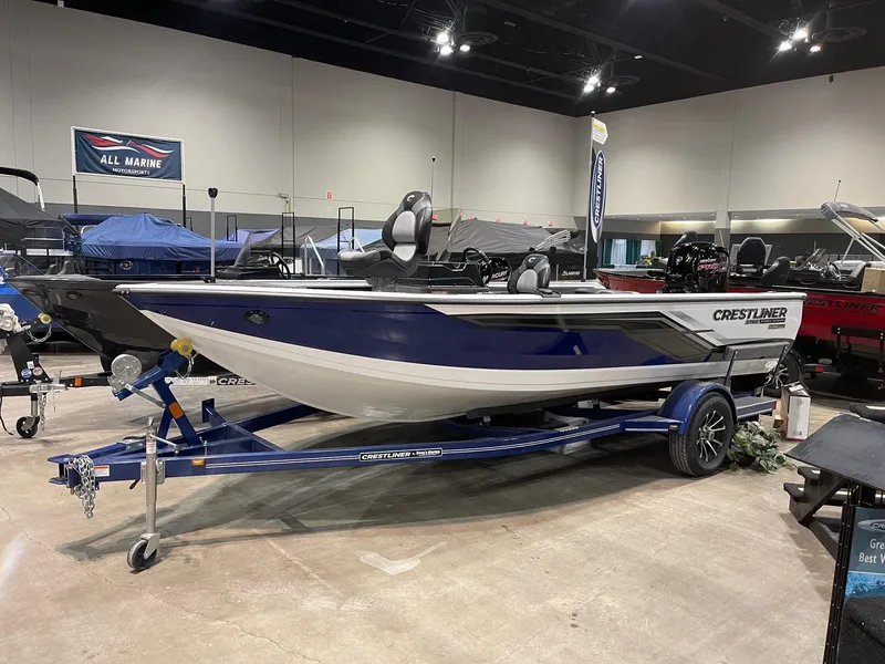 The Image of 2025 Crestliner 1750 Fish Hawk boat on display in showroom. - 0