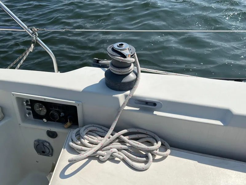 Slide: The Image of Sailboat deck with winch and rope, C&C 35 MKIII, 1983 model, on water. - 10