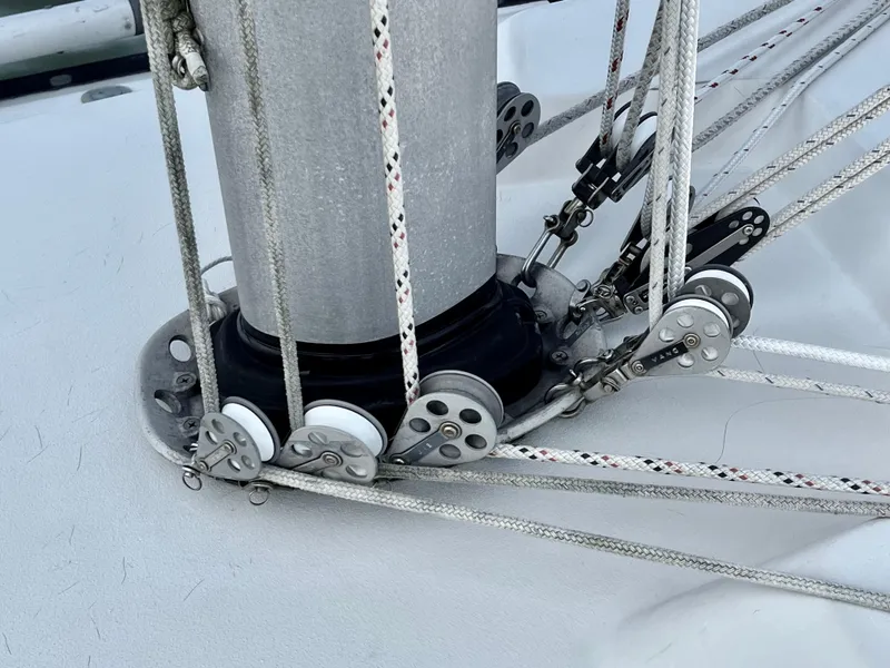Slide: The Image of Rigging and pulleys on a 1983 C&C 35 MKIII sailboat mast. - 17