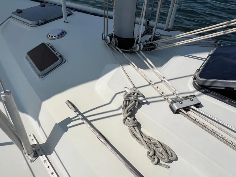 Slide: The Image of Deck of 1983 C&C 35 MKIII sailboat with ropes and fittings. - 18