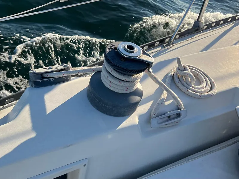 Slide: The Image of Sailboat deck with winch and ropes, C&C 35 MKIII, 1983 model, on water. - 23