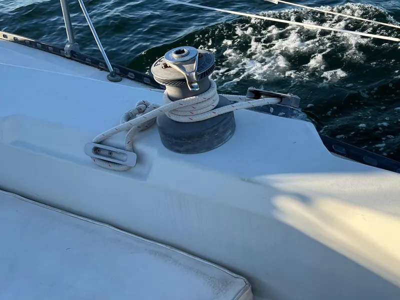 Slide: The Image of Sailboat deck with winch and rope, C&C 35 MKIII, 1983 model, on water. - 24