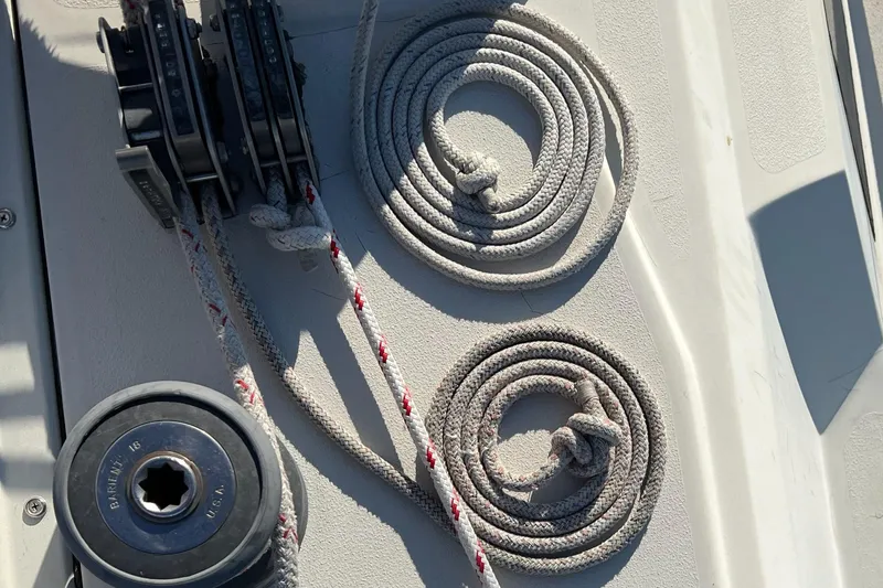 Slide: The Image of Coiled ropes and winch on 1983 C&C 35 MKIII sailboat deck. - 29