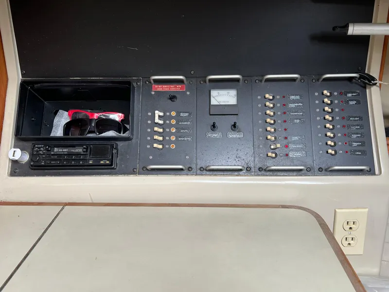 Slide: The Image of Electrical panel of a 1983 C&C 35 MKIII sailboat with switches and gauges. - 40