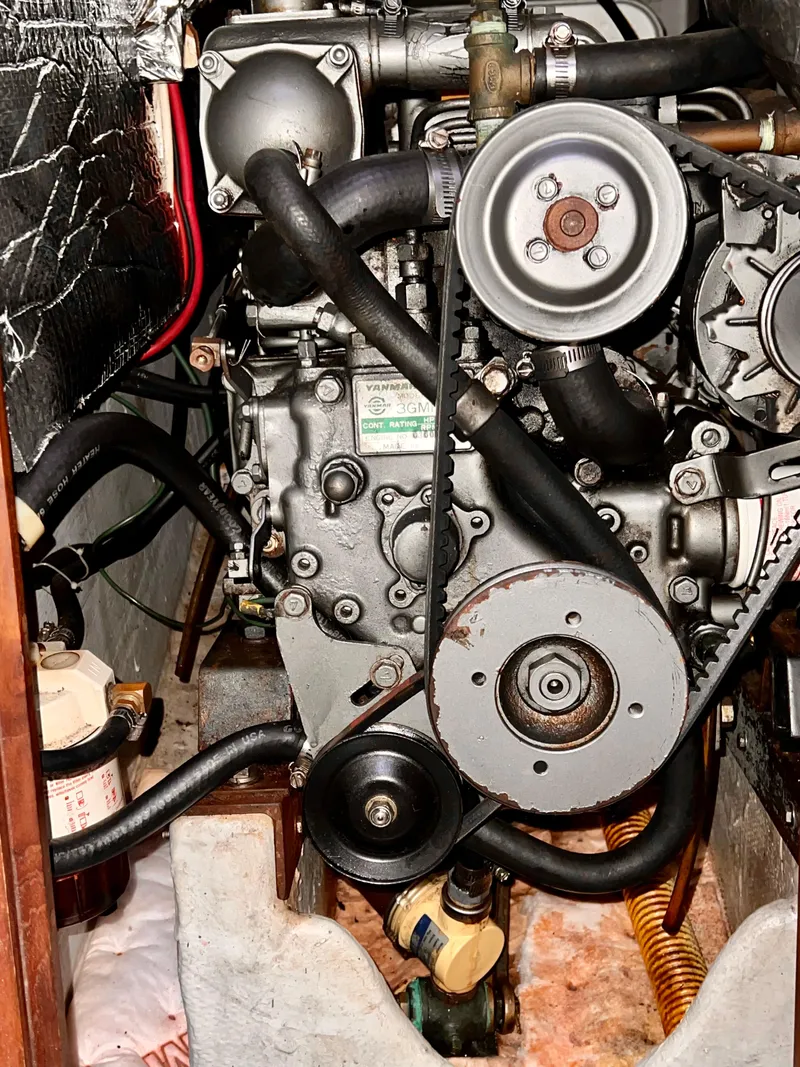 Slide: The Image of Engine compartment of a 1983 C&C 35 MKIII sailboat, showing detailed mechanical components. - 42