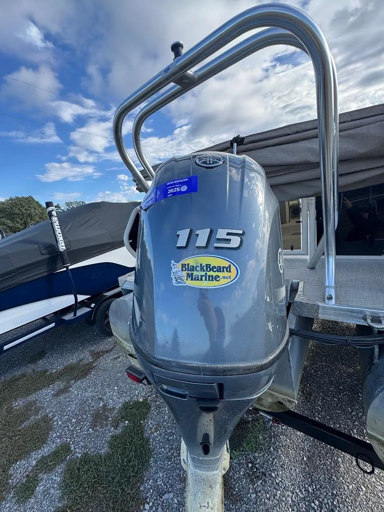 Slide: The Image of 2021 Aloha Pontoon Tropical Series with 115 HP outboard motor by BlackBeard Marine. - 2