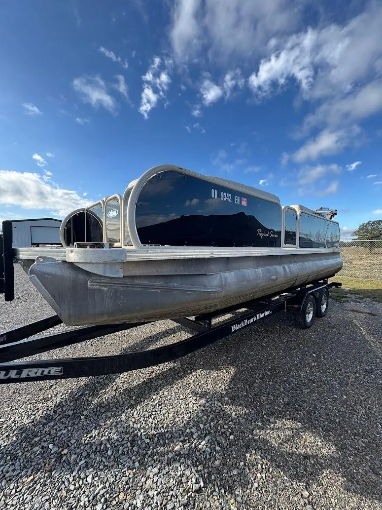 Slide: The Image of 2021 Aloha Pontoon Tropical Series metal identification plate with serial number. - 4