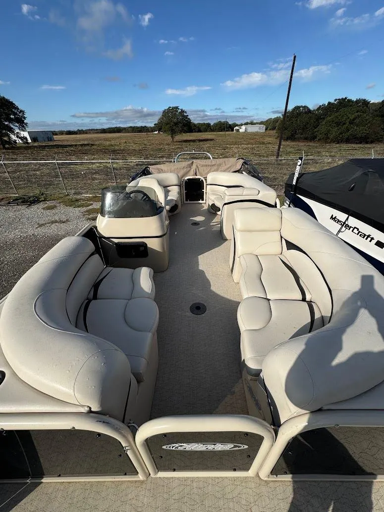 Slide: The Image of 2021 Aloha Pontoon Tropical Series interior with spacious seating and modern design. - 5