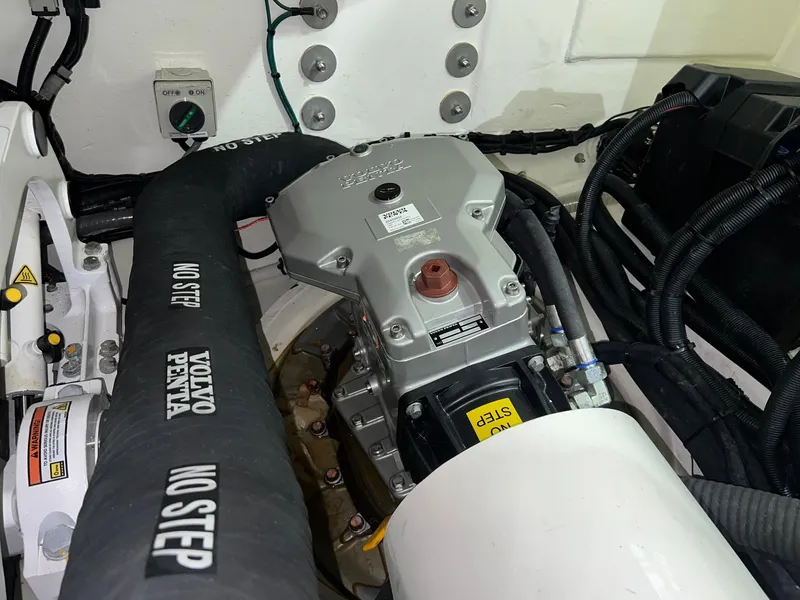 Slide: The Image of Engine compartment of 2023 Riviera 4600 Sport Yacht Platinum Edition with Volvo Penta components. - 28