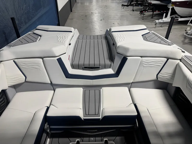 Slide: The Image of 2025 Nautique Super Air Nautique G23 interior with sleek, modern seating design. - 6