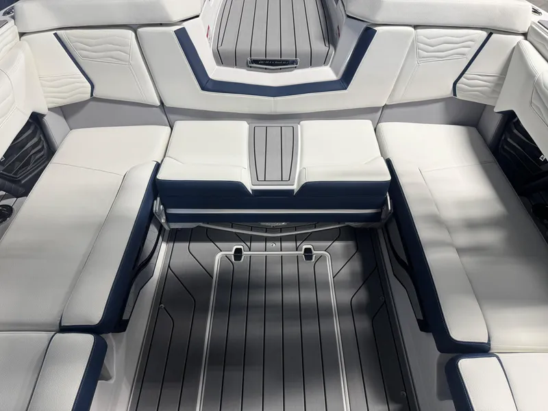 Slide: The Image of 2025 Nautique Super Air Nautique G23 interior with sleek, modern seating and stylish design. - 8