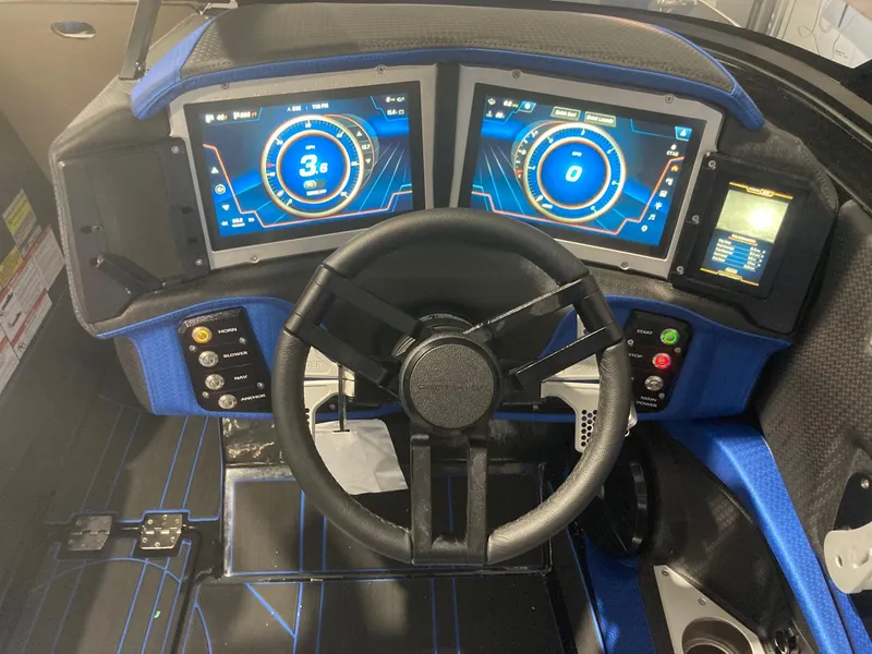 Slide: The Image of 2023 Centurion Ri230 dashboard with dual digital displays and steering wheel. - 4