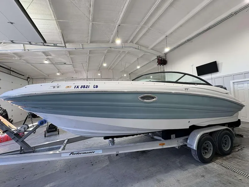 Slide: The Image of 2017 SouthWind 2400 SD boat on trailer in indoor storage facility. - 7