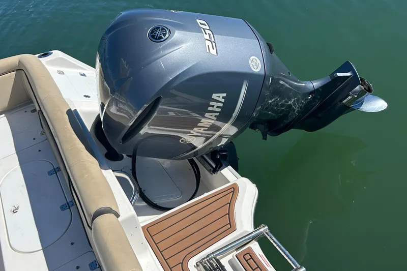 Slide: The Image of 2018 Tidewater 232 LXF boat with Yamaha 250 outboard motor on water. - 3