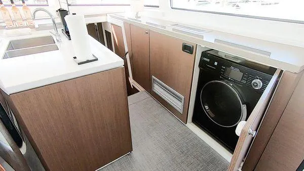 Slide: The Image of Modern kitchen area in a 2021 Bali 5.4 yacht with integrated appliances. - 22