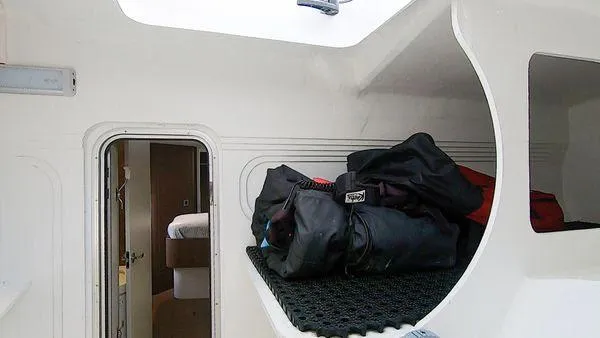 Slide: The Image of Interior of a 2021 Bali 5.4 yacht with luggage on a shelf. - 24