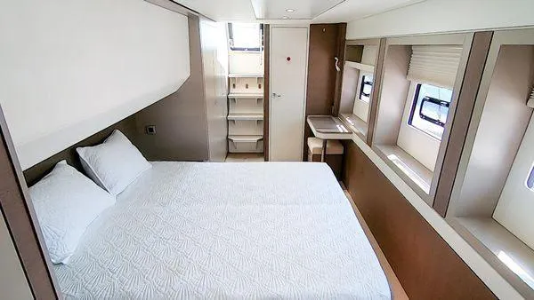 Slide: The Image of Luxurious cabin interior of 2021 Bali 5.4 yacht with bed and windows. - 25