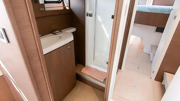 Slide: The Image of Interior of 2021 Bali 5.4 yacht featuring bathroom and cabin with modern amenities. - 29