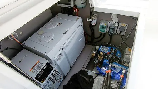 Slide: The Image of Electrical compartment of a 2021 Bali 5.4 yacht, featuring power systems and equipment. - 31