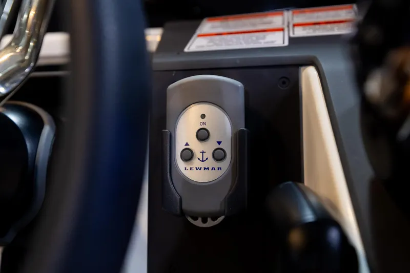 Slide: The Image of Lewmar control panel on 2024 Quarken 27 T-Top V2 boat dashboard. - 17