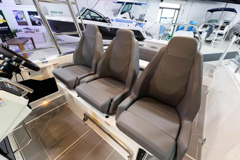 Slide: The Image of 2024 Quarken 27 T-Top V2 boat interior with three sleek, modern seats. - 20