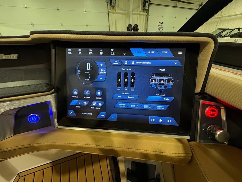 Slide: The Image of 2025 MasterCraft XT22 dashboard with advanced touchscreen controls and navigation system. - 16
