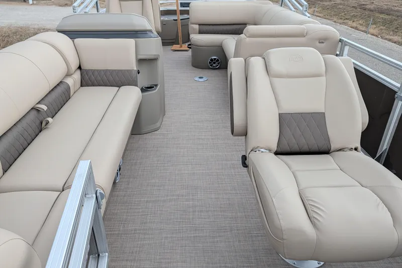 Slide: The Image of Luxurious interior of 2025 Sun Tracker SportFish 20 DLX pontoon boat with plush seating. - 92