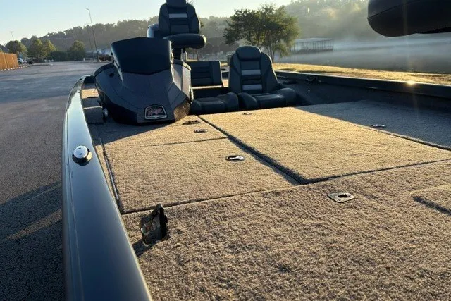 Slide: The Image of 2025 Ranger RT198P boat with frosted deck, parked outdoors at sunrise. - 29