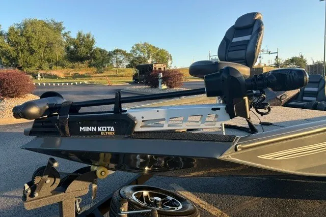 Slide: The Image of 2025 Ranger RT198P boat with Minn Kota Ultrex trolling motor in a sunny outdoor setting. - 30