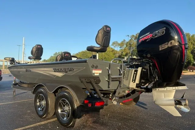 Slide: The Image of 2025 Ranger RT198P boat with Mercury Pro XS 150 engine, parked outdoors. - 5