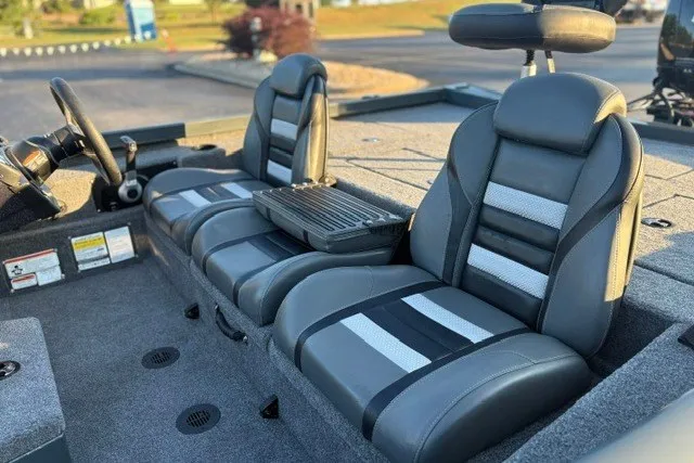 Slide: The Image of 2025 Ranger RT198P boat interior with sleek, modern seating and console design. - 15