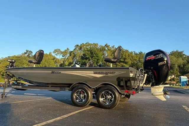 Slide: The Image of 2025 Ranger RT198P fishing boat with trailer and powerful outboard motor. - 8