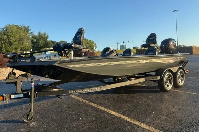 Slide: The Image of 2025 Ranger RT198P fishing boat on trailer in parking lot. - 10