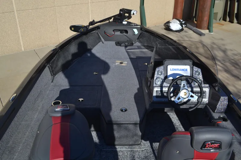 Slide: The Image of 2025 Ranger VS1882SC Angler boat interior with steering console and Lowrance electronics. - 3