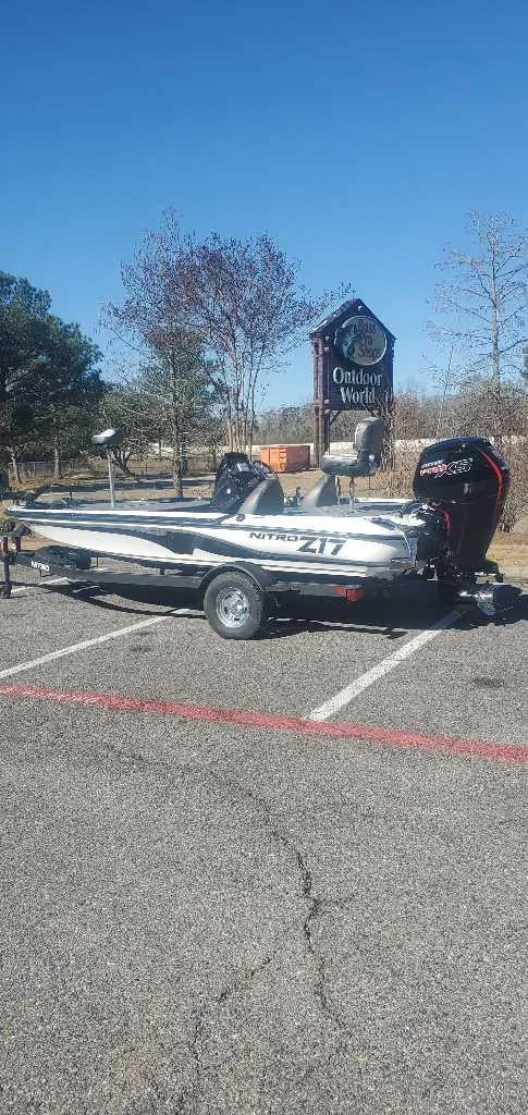 Slide: The Image of 2025 Nitro Z17 boat parked outdoors on a sunny day. - 4