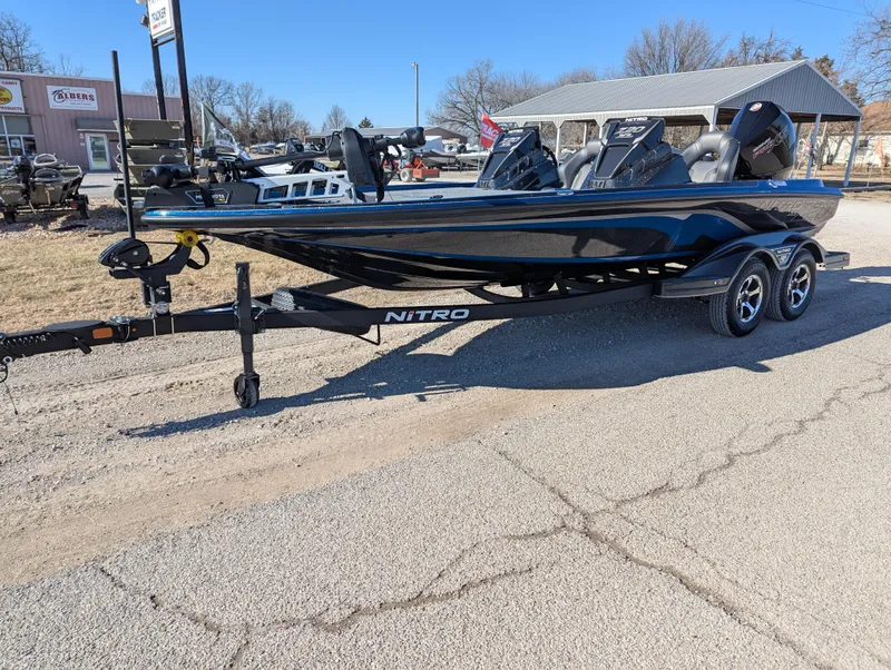 Slide: The Image of 2025 Nitro Z20 XL Pro boat on trailer, parked outdoors. - 0