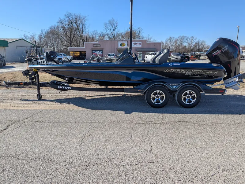 Slide: The Image of 2025 Nitro Z20 XL Pro boat on trailer, parked outdoors. - 1