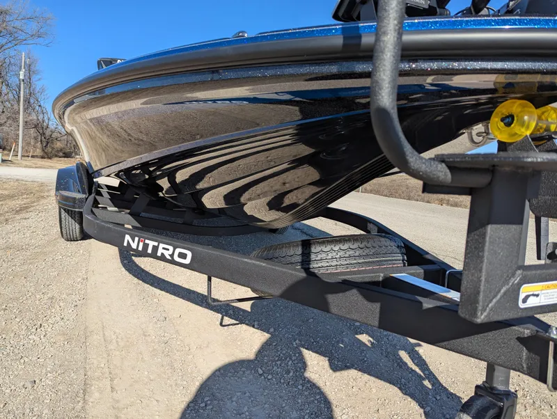 Slide: The Image of 2025 Nitro Z20 XL Pro boat on trailer, close-up view. - 10