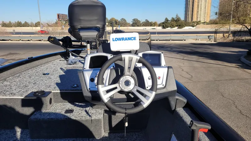 Slide: The Image of 2025 Tracker Pro Team 190 boat dashboard with Lowrance electronics. - 5
