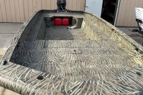 Slide: The Image of 2025 Tracker Grizzly 1650 T Prairie Wings Edition boat with camouflage design. - 3