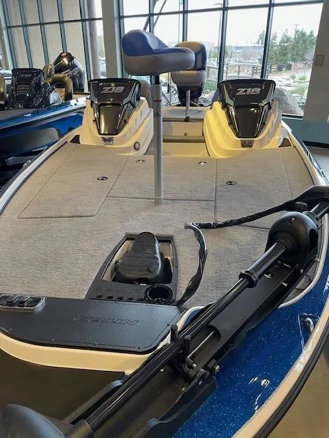 Slide: The Image of 2025 Nitro Z18 boat storage compartments open, showcasing spacious interior design. - 6