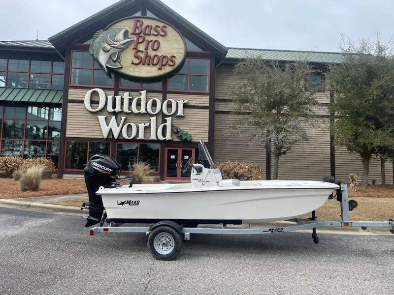 The Image of 2025 Mako Pro Skiff 13 CC boat on trailer outside Bass Pro Shops Outdoor World. - 0