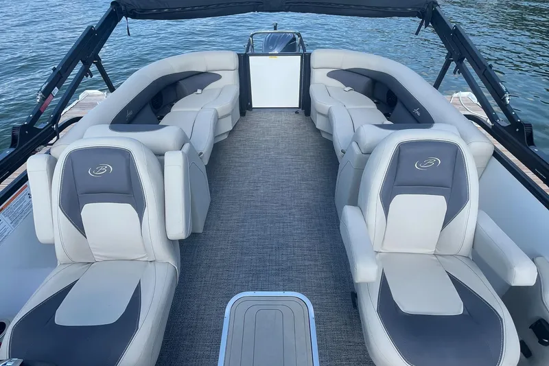 Slide: The Image of 2024 Barletta ARIA 22QC pontoon boat interior with luxurious seating and spacious layout. - 9